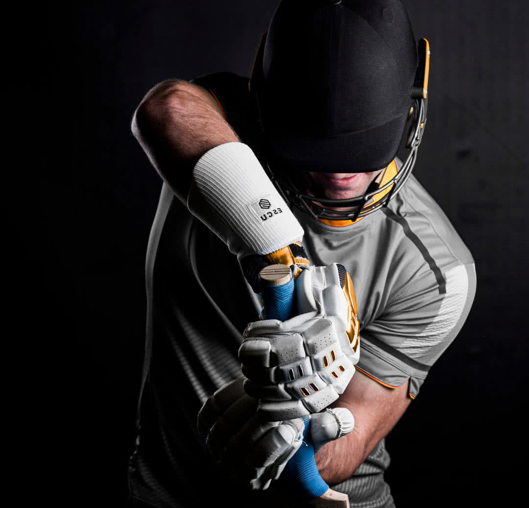 cricketer on dark background